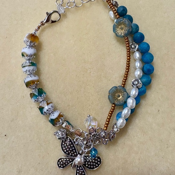 Silver Capped Czech glass Beads on a leather bracelet. Butterfly charm, - Picture 2 of 4